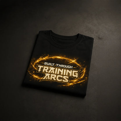 Black gym tee with 'Built Through Training Arcs' in glowing gold, bold streetwear design for fitness enthusiasts