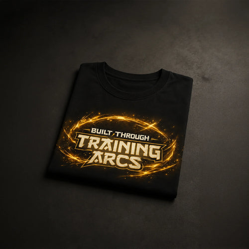 Black gym tee with 'Built Through Training Arcs' in glowing gold, bold streetwear design for fitness enthusiasts