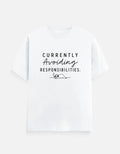 White graphic tee with 'Currently Avoiding Responsibilities' text and sleeping sloth design