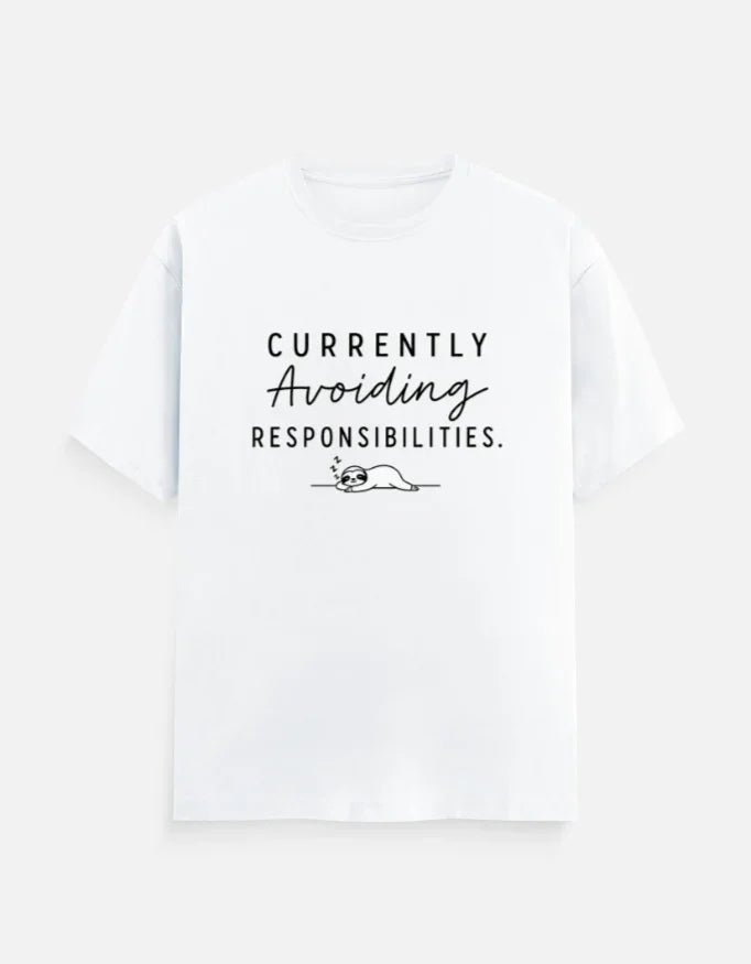 White graphic tee with 'Currently Avoiding Responsibilities' text and sleeping sloth design
