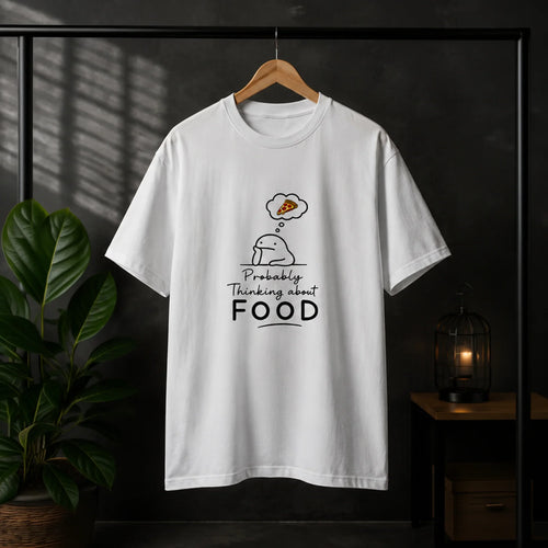 White graphic tee with cute character thinking about pizza, bold 'Probably Thinking about FOOD' text, streetwear style