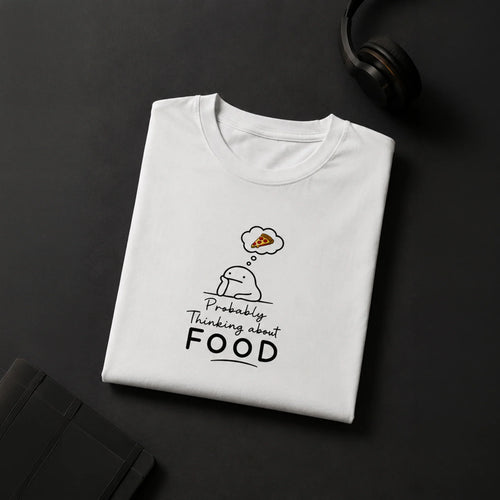 White graphic tee with cute character thinking about pizza, bold 'Probably Thinking about FOOD' text, streetwear style