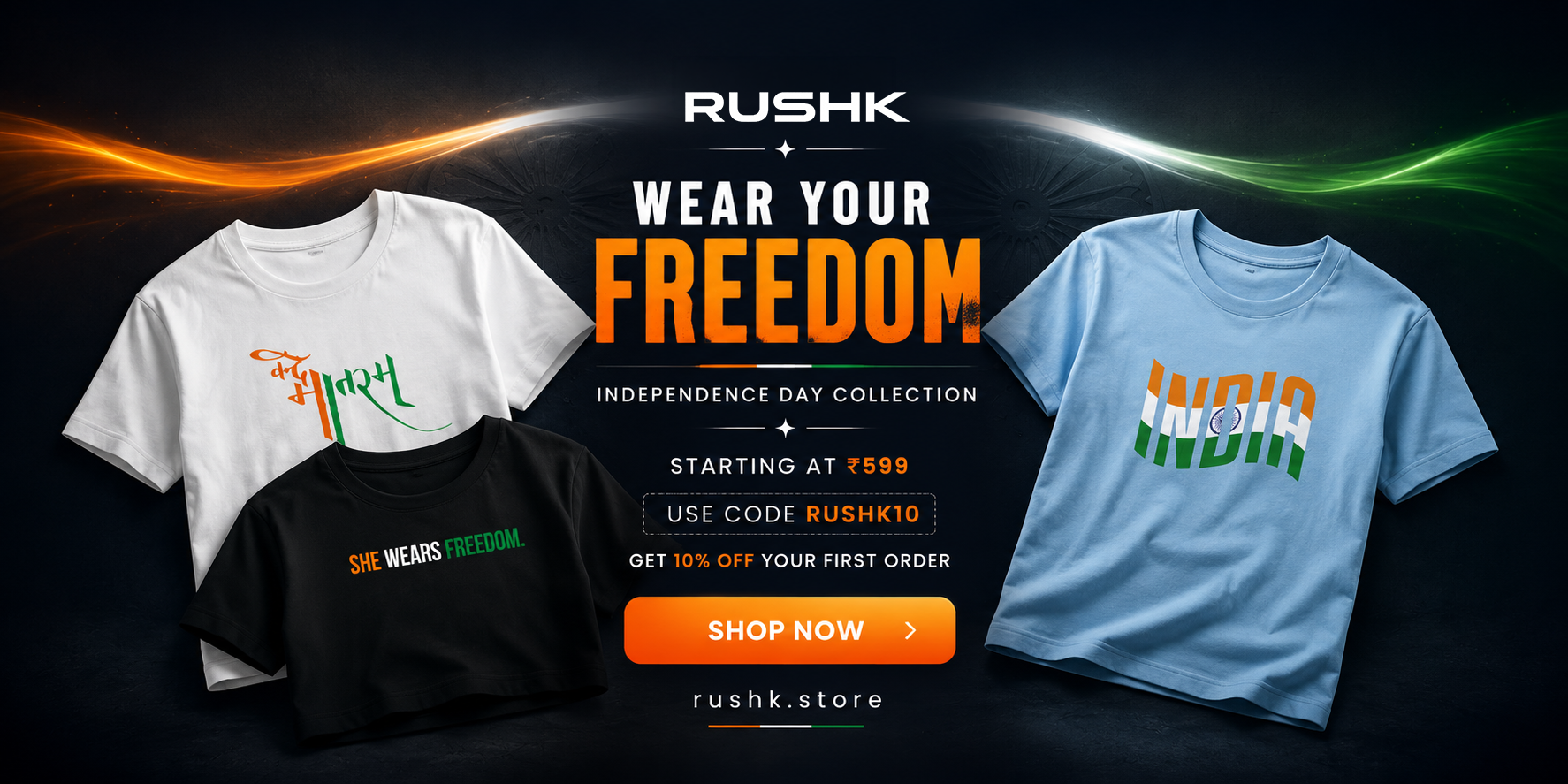 Promotional banner for RUSHK Independence Day Collection showing three t-shirts: a white shirt with orange and green graphic, a black shirt with orange text, and a light blue shirt with orange, white, and green 'INDIA' text. The center features promotional text 'WEAR YOUR FREEDOM' and a 'SHOP NOW' button.